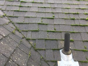 A close up of the roof shingles on a house