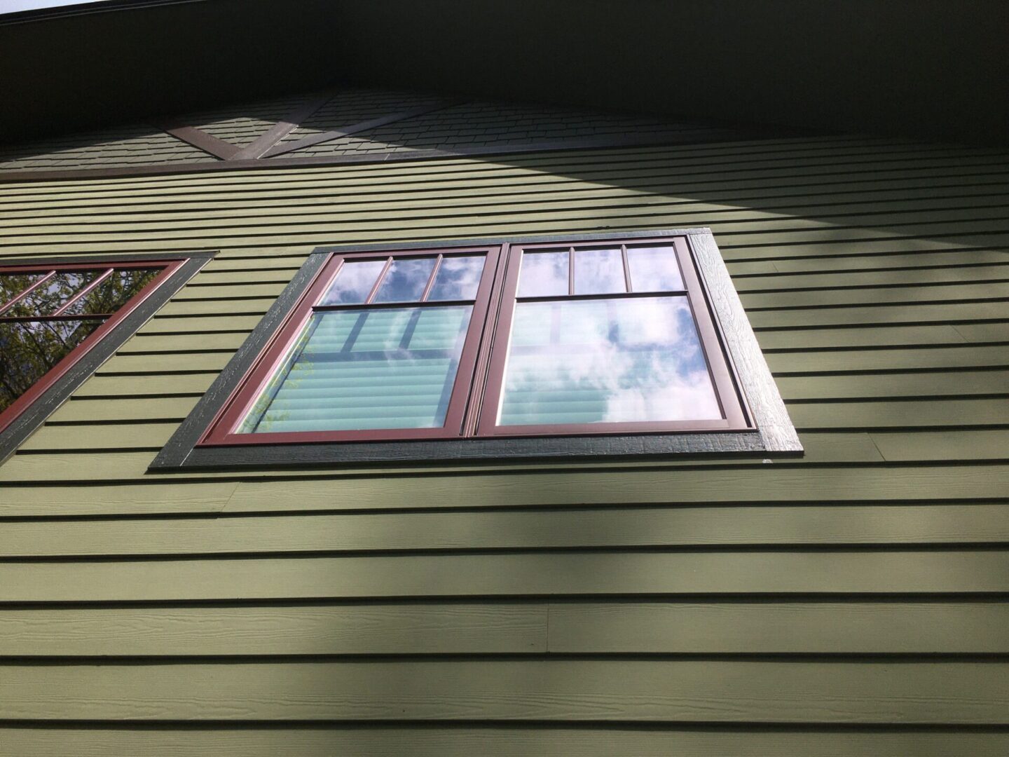 A window on the side of a house.